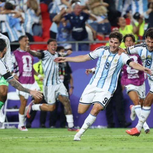Argentina's forward #09 Julian Alvarez celebrates scoring his team's second goal with Argentina's forward #10 Lionel Messi and Argentina's defender #06 Lisandro Martinez during the 2026 World Cup football tournament quarter-final match between Argentina and Switzerland at the Kansas City Stadium in Kansas City on July 11, 2026.  (Photo by Thomas COEX / AFP)