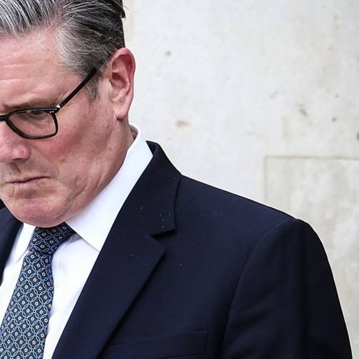 (FILES) Britain's Prime Minister Keir Starmer reacts as he prepares to leave the Elysee Presidential Palace in Paris on April 17, 2026. British Prime Minister Keir Starmer promised on May 9, 2026, he would "listen to voters" after his Labour party received a historic drubbing in local and regional elections. (Photo by Tom Nicholson / POOL / AFP)